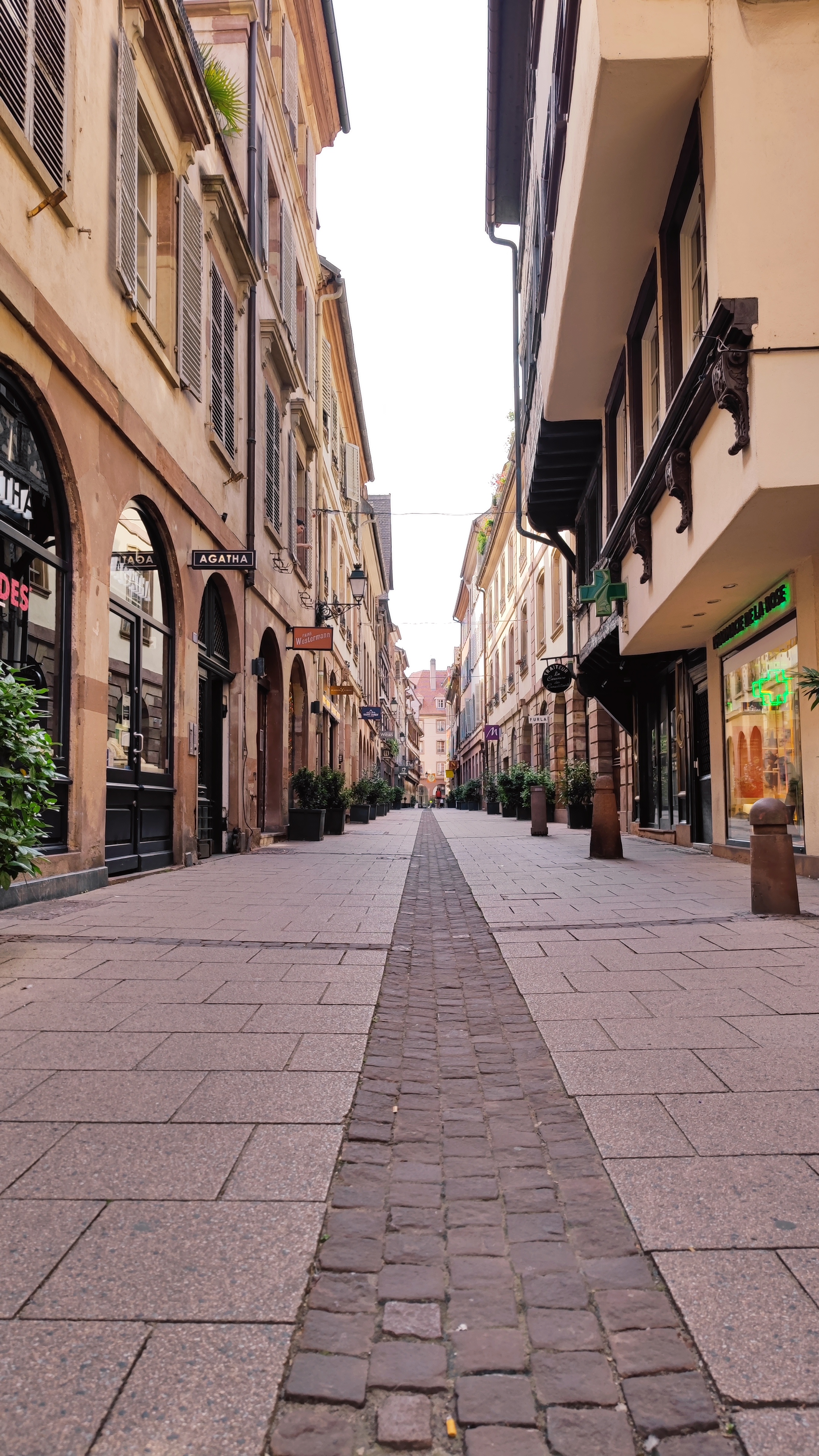 A walking street. The camera is close to the ground.